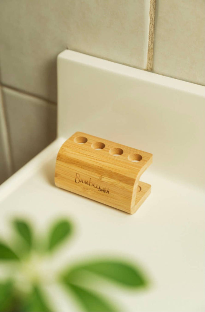 Bamboo Toothbrush Stand 4 Tier Allows toothbrush to air dry to help with dental hygiene and teeth and Holds up to Four compostable and Zero waste by Bamboo Switch